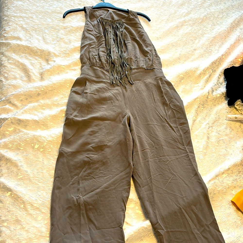 Jumpsuit. Gray sleeveless elegant